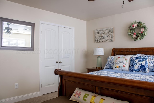 carpeted bedroom with baseboards, ceiling fan, and a closet