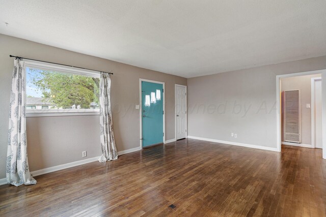 4300 Gables St, Amarillo, TX 79110 - unfurnished room with wood finished floors and a heating unit