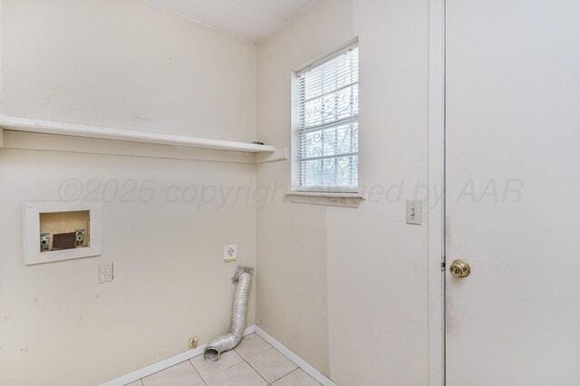 1736 Jennifer St, Amarillo, TX 79107 - laundry room featuring light tile patterned floors and washer hookup