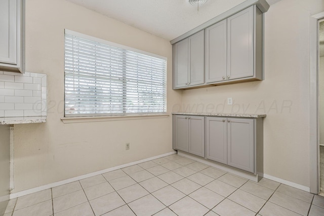 1736 Jennifer St, Amarillo, TX 79107 - unfurnished dining area with light tile patterned floors