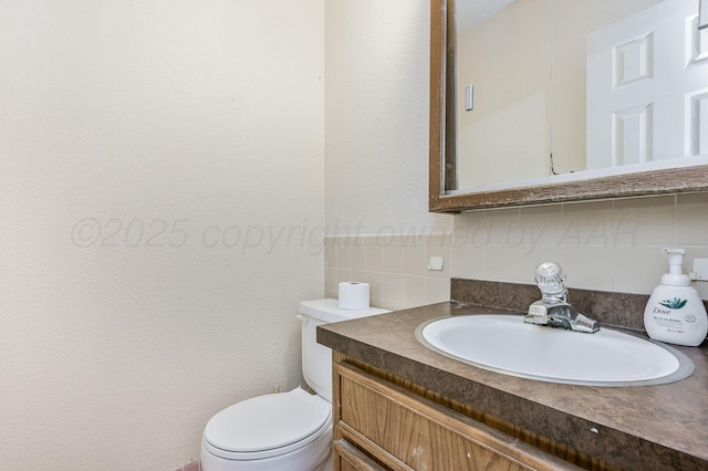 1736 Jennifer St, Amarillo, TX 79107 - bathroom with vanity and decorative backsplash