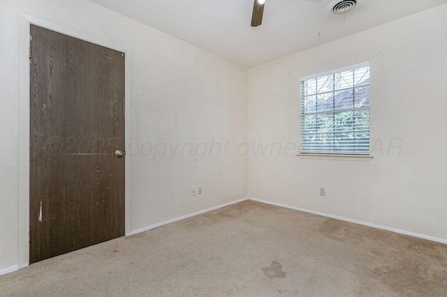 1736 Jennifer St, Amarillo, TX 79107 - unfurnished room featuring carpet floors and a ceiling fan