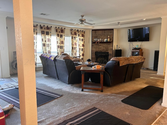 living room with ceiling fan, light carpet, and ornamental molding