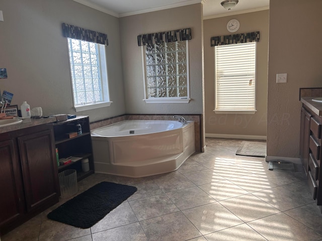 bathroom featuring vanity, a tub, tile patterned flooring, and crown molding