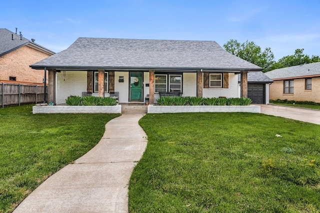 1607 N Mary-Ellen St, Pampa, TX 79065 - view of front of home featuring brick siding, a porch, roof with shingles, driveway, and an attached garage