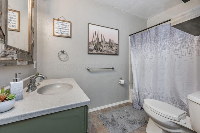 1607 N Mary-Ellen St, Pampa, TX 79065 - bathroom with vanity, toilet, baseboards, and shower / tub combo