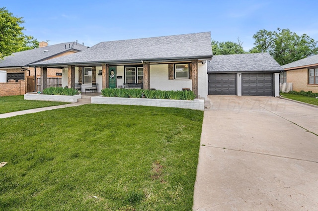 1607 N Mary-Ellen St, Pampa, TX 79065 - view of front of home with brick siding, covered porch, driveway, roof with shingles, and an attached garage