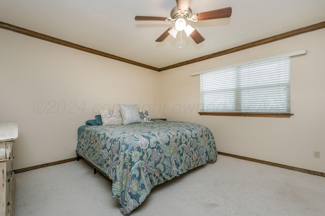 314 Fir St, Hereford, TX 79045 - carpeted bedroom with crown molding, baseboards, and ceiling fan
