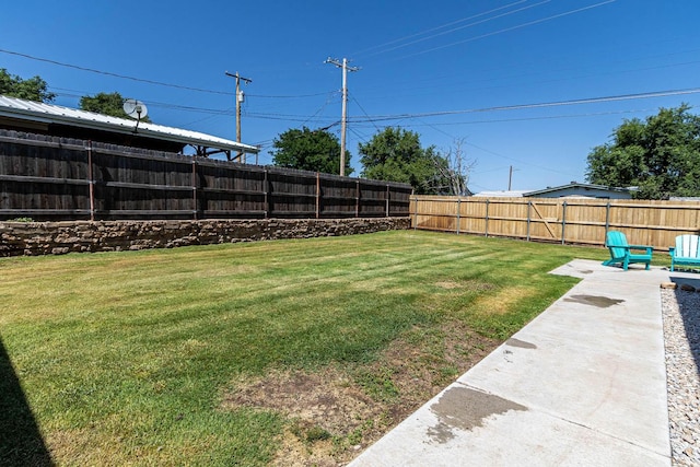 215 Abilene St, Borger, TX 79007 - fenced backyard with a patio area