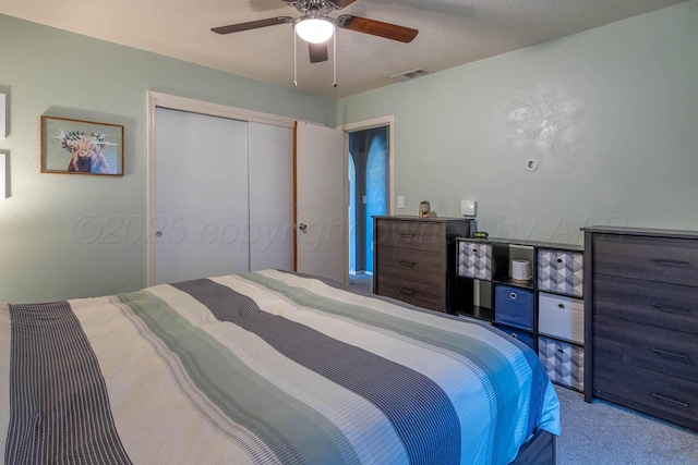 215 Abilene St, Borger, TX 79007 - carpeted bedroom featuring a closet and ceiling fan