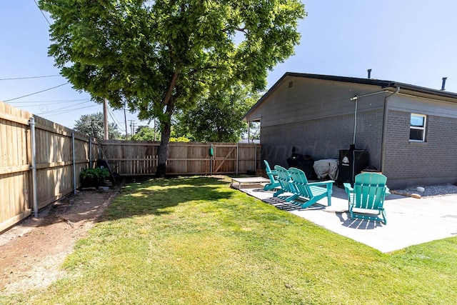 215 Abilene St, Borger, TX 79007 - fenced backyard featuring a patio