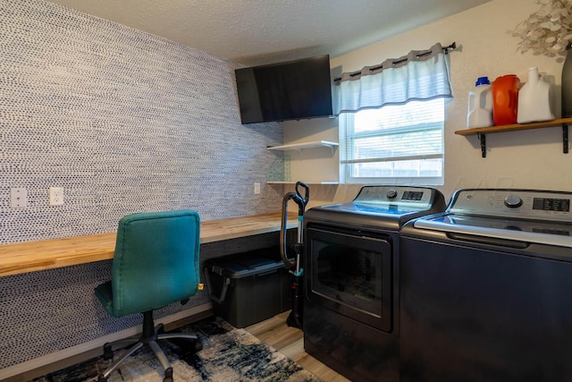 215 Abilene St, Borger, TX 79007 - laundry area with washing machine and dryer, a textured ceiling, light wood-type flooring, and an office area