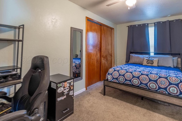 215 Abilene St, Borger, TX 79007 - carpeted bedroom featuring a closet, a desk, and ceiling fan