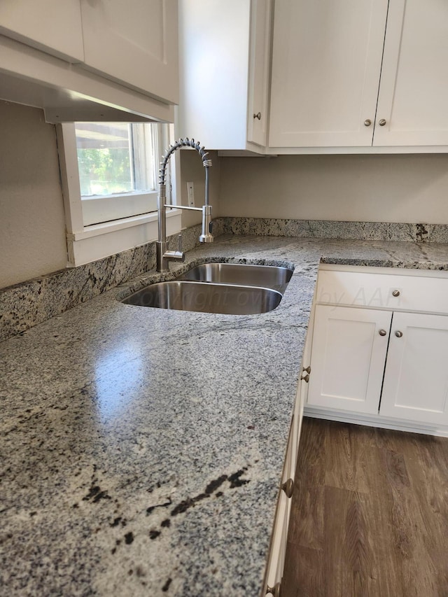 904 S Mississippi St, Amarillo, TX 79106 - kitchen featuring a sink, white cabinetry, and light stone countertops