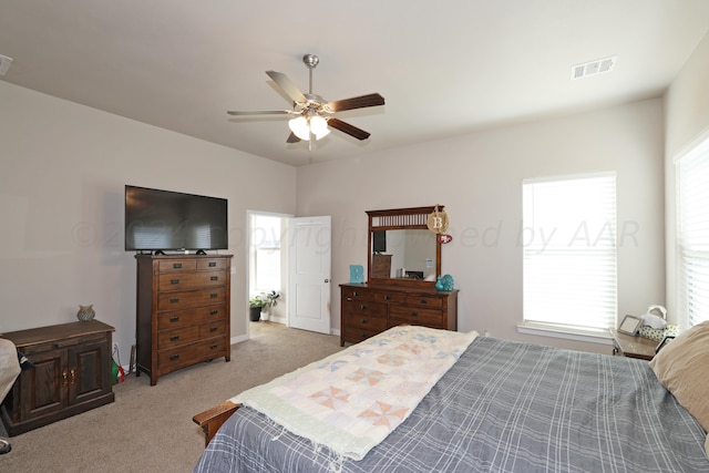 9709 Sydney Dr, Amarillo, TX 79119 - bedroom with light carpet and a ceiling fan