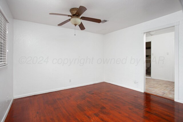 2501 S Bivins St, Amarillo, TX 79103 - empty room with wood finished floors and ceiling fan