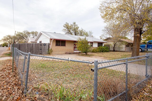 2501 S Bivins St, Amarillo, TX 79103 - ranch-style house with brick siding and a metal roof