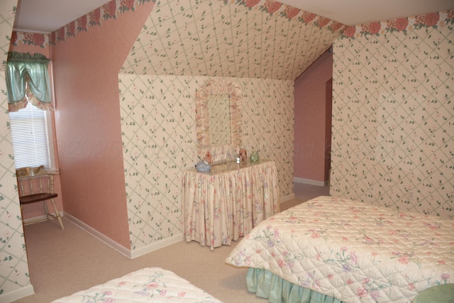 bedroom with carpet flooring, baseboards, and wallpapered walls