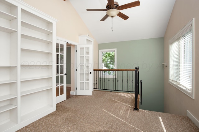 2615 S Hayden St, Amarillo, TX 79109 - hallway with french doors, carpet, and lofted ceiling