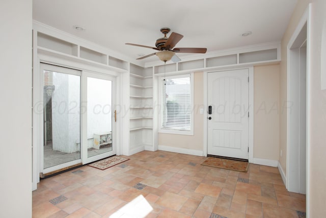 2615 S Hayden St, Amarillo, TX 79109 - entrance foyer featuring a ceiling fan and light stone finish flooring