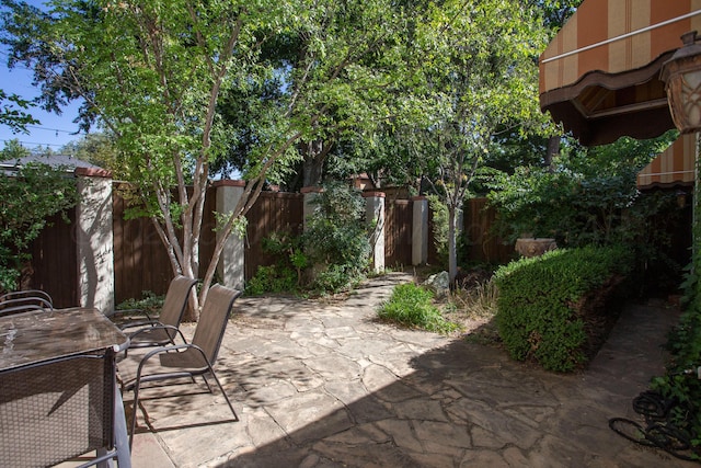 2615 S Hayden St, Amarillo, TX 79109 - fenced backyard with a patio area and outdoor dining space