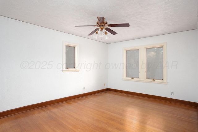 2615 S Hayden St, Amarillo, TX 79109 - unfurnished room with ceiling fan, light wood-style floors, and a textured ceiling