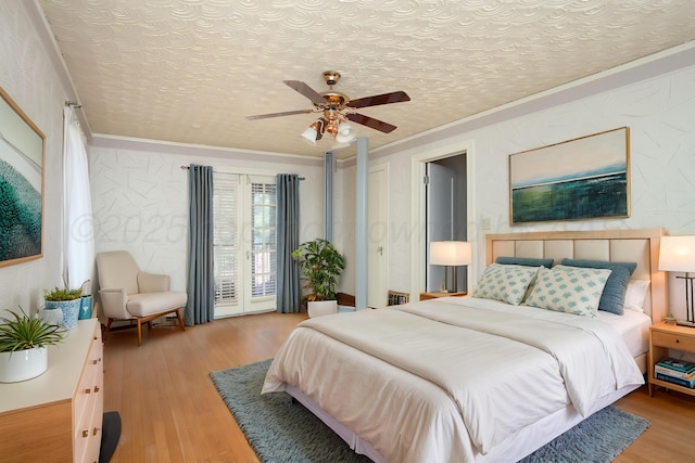 2615 S Hayden St, Amarillo, TX 79109 - bedroom with ornamental molding, wood finished floors, access to exterior, and a ceiling fan
