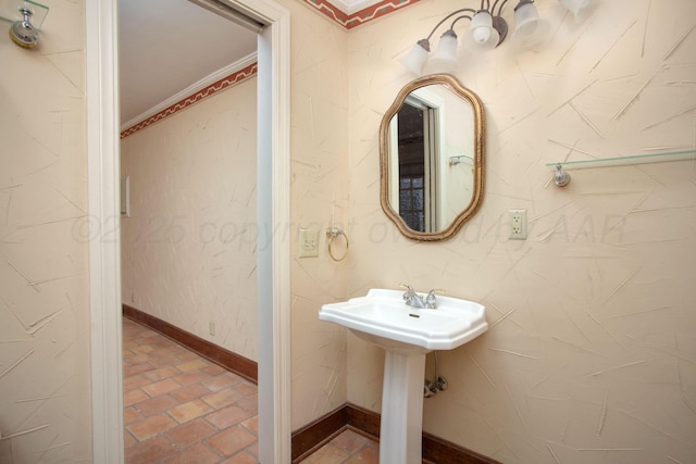 2615 S Hayden St, Amarillo, TX 79109 - bathroom featuring ornamental molding and brick floors