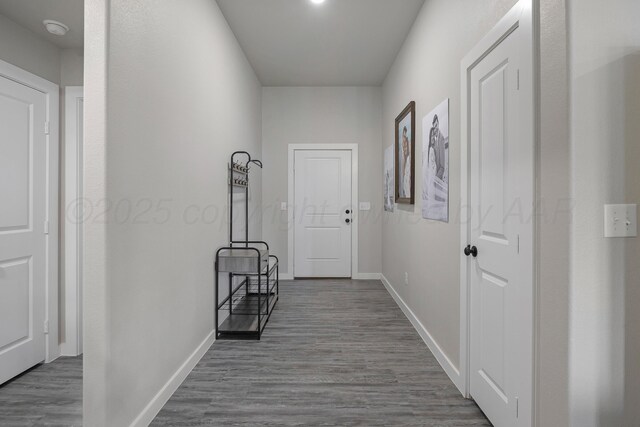 1801 Callaway Pl, Amarillo, TX 79118 - hallway with baseboards and dark wood-style floors