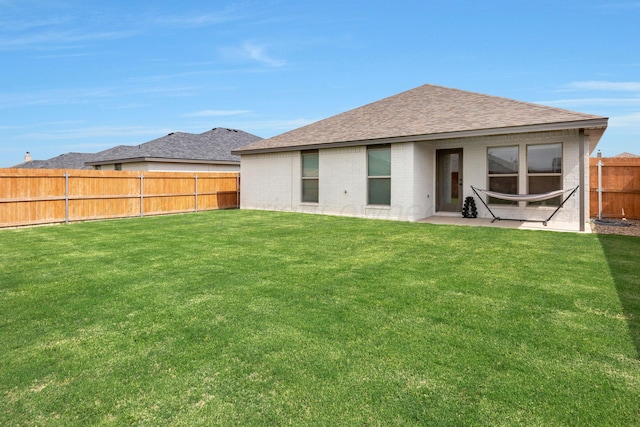 1801 Callaway Pl, Amarillo, TX 79118 - rear view of property with brick siding, roof with shingles, and a patio area