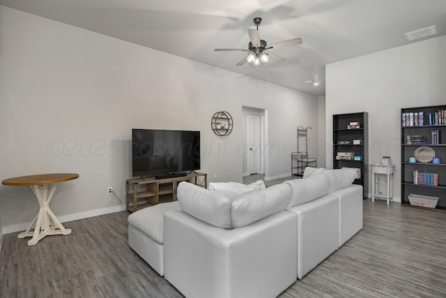1801 Callaway Pl, Amarillo, TX 79118 - living area featuring a ceiling fan, wood finished floors, and baseboards