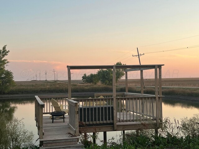 14680 County Road 6, Booker, TX 79005 - dock featuring a water view