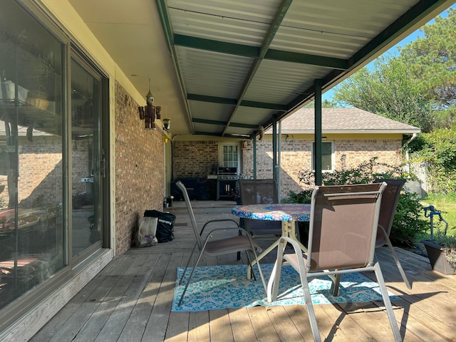 14680 County Road 6, Booker, TX 79005 - wooden deck featuring outdoor dining area