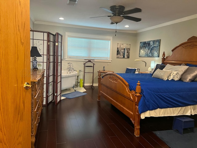 14680 County Road 6, Booker, TX 79005 - bedroom with wood finished floors, baseboards, crown molding, ceiling fan, and recessed lighting