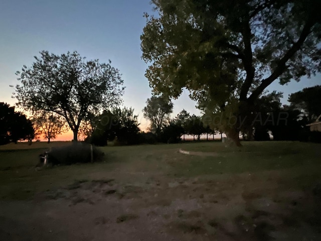 14680 County Road 6, Booker, TX 79005 - view of yard at dusk