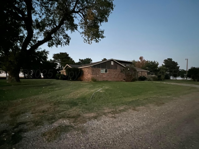14680 County Road 6, Booker, TX 79005 - view of home's exterior with a yard