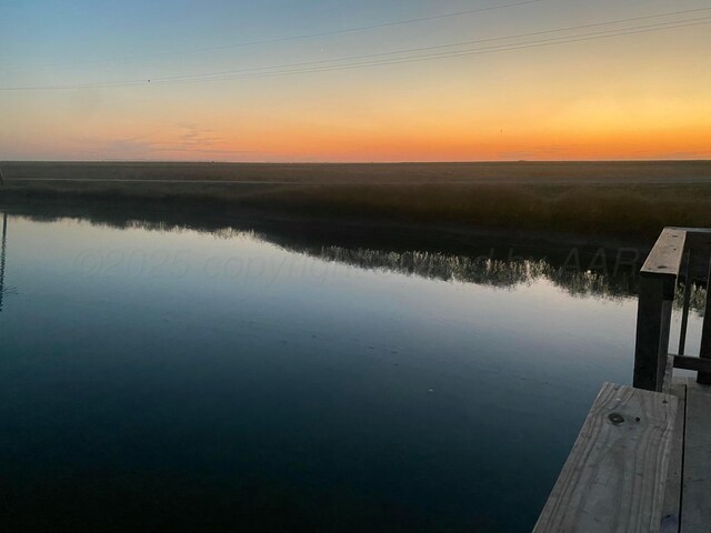 14680 County Road 6, Booker, TX 79005 - water view with a boat dock