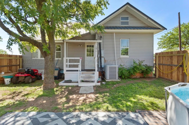 110 N Houston St, Shamrock, TX 79079 - back of house with a metal roof