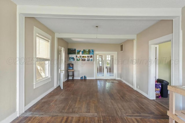 110 N Houston St, Shamrock, TX 79079 - unfurnished dining area with french doors and wood finished floors