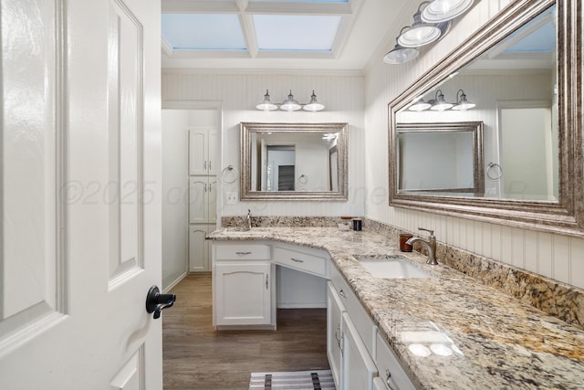 7809 Tarter Ave, Amarillo, TX 79121 - full bathroom with coffered ceiling, double vanity, wood finished floors, crown molding, and beam ceiling