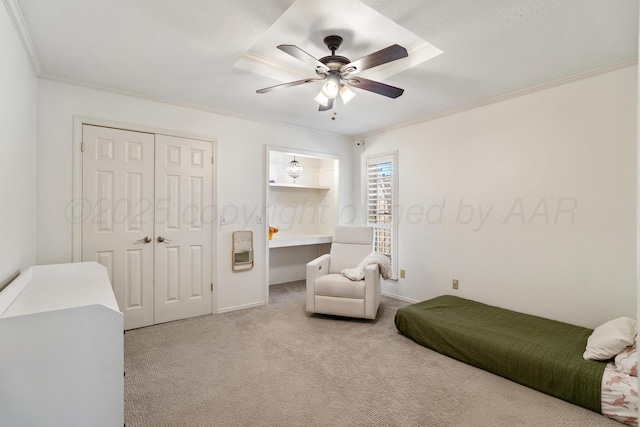 7809 Tarter Ave, Amarillo, TX 79121 - bedroom featuring ornamental molding, carpet floors, a ceiling fan, and a closet