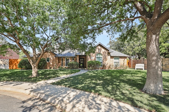 view of front of property with a front lawn