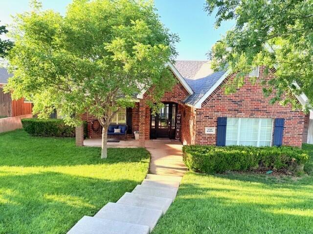 6508 Bayberry Ln, Amarillo, TX 79124 - view of front of house featuring a front yard and brick siding