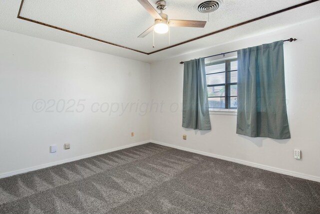 6206 Yale St, Amarillo, TX 79109 - empty room with dark carpet and a ceiling fan
