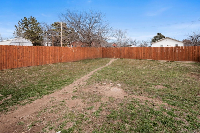 view of yard with fence