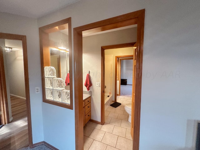 corridor featuring light hardwood / wood-style flooring