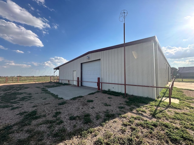 view of outbuilding featuring a garage