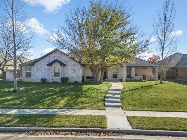 view of front of home with a front lawn