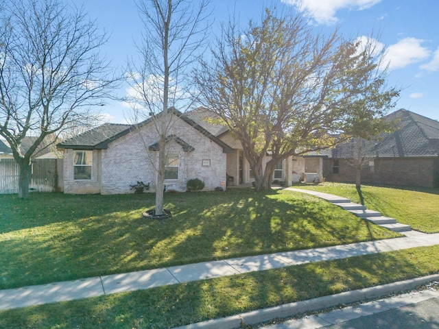 view of front of home featuring a front lawn