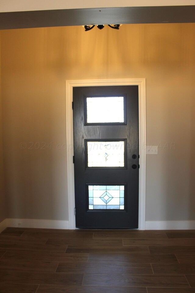 8104 Miami Ave, Amarillo, TX 79118 - entrance foyer featuring baseboards and dark wood-style flooring